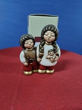 COPPIA BIMBI CON BAMBOLA