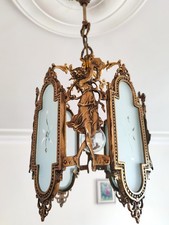 Lampadario cherubino ottone