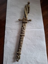 Antico tagliacarte in ottone