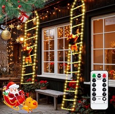 Babbo Natale su scala luminosa