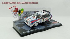 143 LANCIA DELTA MARTINI S4 RALLY IXO,NO NOREV,BBURAGO,WELLY,DEA,SPARK,