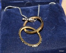 Ciondolo anelli intrecciati in