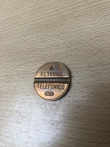 Gettone telefonico cmm 7610 - gettone,