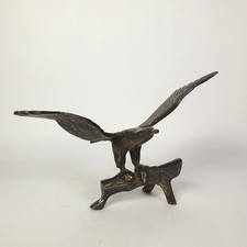 Un'aquila su un ramo, ottone