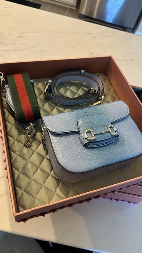 Gucci pelle stampa lucertola