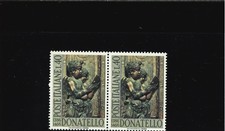 DONATELLO PUNTO CROCE SUL SENO VICINO ALLA SPALLA POS 23 COPPIA CON NORMALE