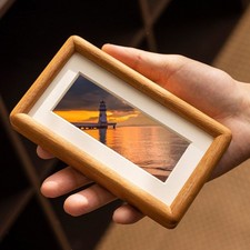 Cornice portafoto in legno