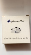 Paracapezzoli argento - in,