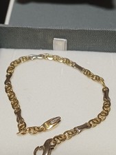 Bracciale uomo in oro giallo e bianco 18Kt. 750/1000