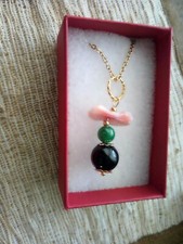 COLLANA CON CIONDOLO SU COCCU