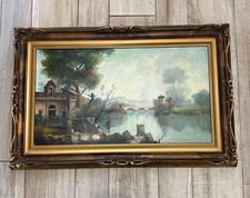 Quadro con cornice dorata -