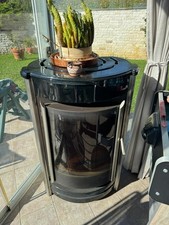 stufa a legna in ghisa e ceramica riscalda 80/100 m2 kw 10,5 una bomba di calore