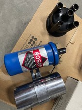 bobina bosch blu con protezione bobina e calotta spinterogeno come da foto