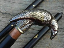 Antico manico testa di corvo