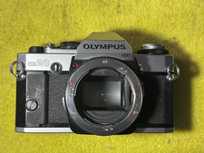 Olympus OM-20 Reflex  testata