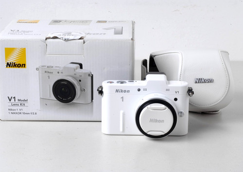 Nikon con obbiettivo - nikon, 1