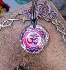 ciondolo orgonite contro inquinamento elettrosmog ,ottimo per ,reiki,yoga  .