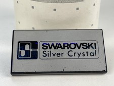 Swarovski figurine dealer sign
