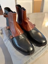 Stivali Alexander McQueen Triple Monk Strap, Nero/Terra Cotta, EU43/US10 Nuovi con scatola