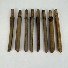 8 antichi denti in legno