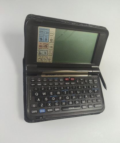 Sharp wizard 8920 pda - iq-8920,