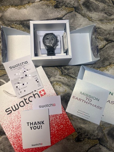 Omega swatch moonwatch - omega,