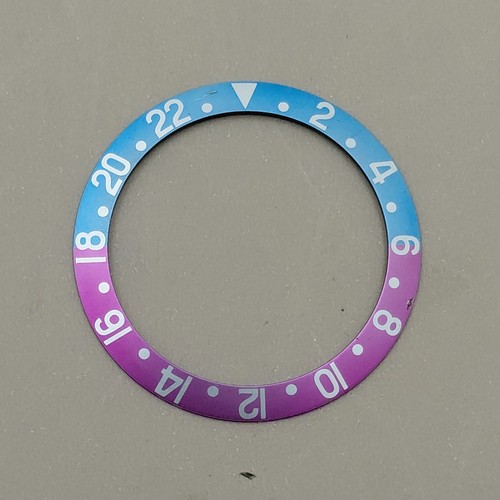 Rolex inserto fucsia - , sbiadito