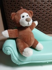 "TRUDI" mini peluche Orso, colore marrone  e bianco , altezza 11 cm.