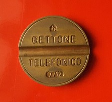 GETTONE TELEFONICO 7712 CON ROTTURA DI CONIO SULLA DATA [K425]