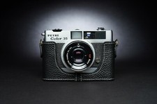 Custodia mezza fotocamera in