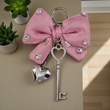 CIONDOLO FIOCCO ROSA 40