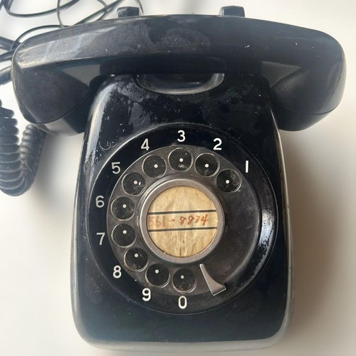 Telefono rotante nero cablato