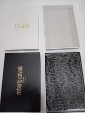 Alviero Martini prima classe Roberto Cavalli Scatole