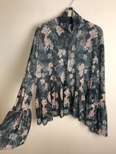 Top nero floreale trasparente