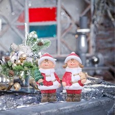 Statuette di bambole in