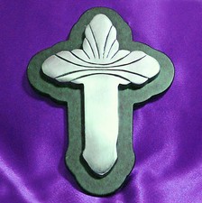 Croce da parete nera e argento