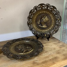 Coppia Di Piatti In Bronzo Raffigurante Profili Di Uomo Donna