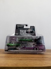 GREENLIGHT GREEN MACHINE 31180-C 1:64 Cadillac Eldor 1974 di Clarence e Alabama