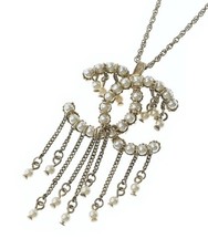 CHANEL Necklaces Gold
