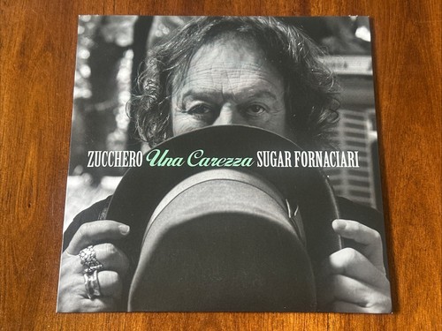 Una carzza zucchero sugar - una,