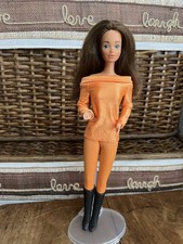 Barbie Tracy bambola bruna