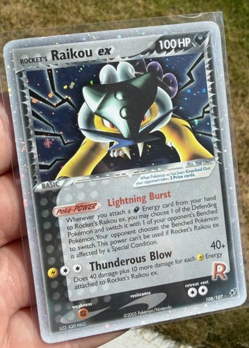 Carta pokemon rocket raikou - carta,
