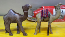 Set 2 statuette in legno fatte