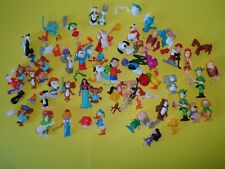 Grande lotto sorpresine componibili Kinder vintage puffi disney fata antenati
