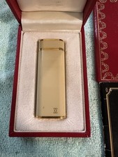 Accendino le must De Cartier mod.  placcato Oro completo di scatola garanzia