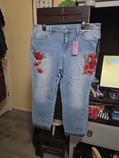 Jeans rosso rosa ricamato