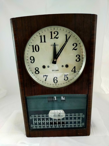 Seiko day date wall clock - 30-day,