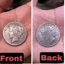 Moneta graffiata due facce 2