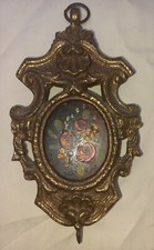 Antica miniatura floreale con