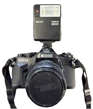 Bella reflex Ricoh XR-10 35mm con macro 3.4-4.5 - 35-70mm buone condizioni.